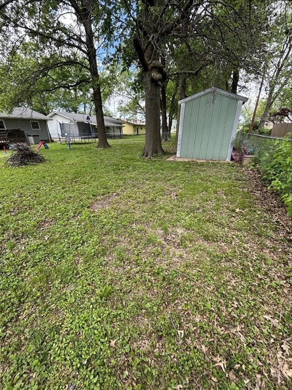 116 Adams St, Centralia, MO 65240 - view of yard with a storage shed and an outdoor structure