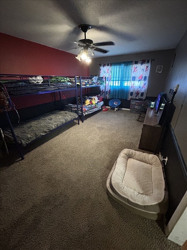 116 Adams St, Centralia, MO 65240 - carpeted bedroom featuring ceiling fan and a textured ceiling