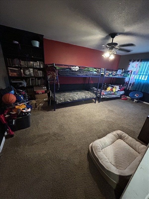 116 Adams St, Centralia, MO 65240 - carpeted bedroom with ceiling fan and a textured ceiling