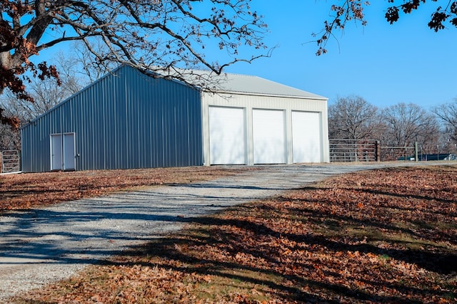 view of outbuilding featuring a garage