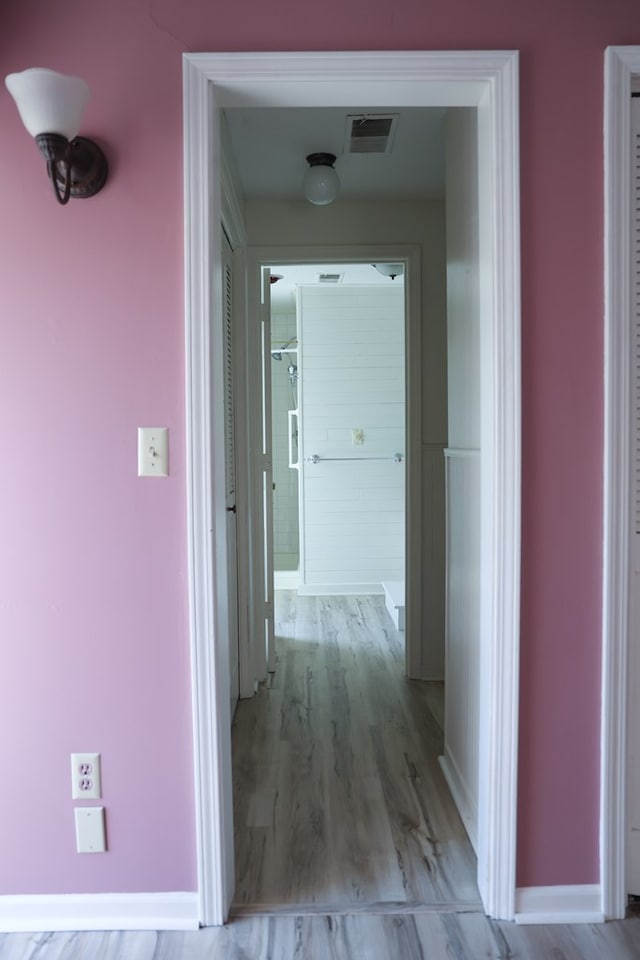 hall featuring light hardwood / wood-style flooring