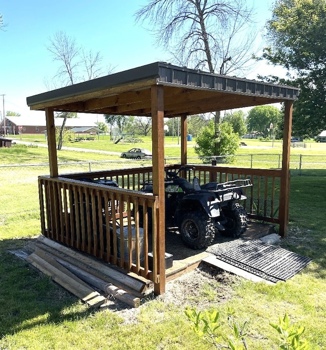 302 Mead St, Utica, MO 64686 - wooden deck with a yard, a gazebo, a detached carport, and fence