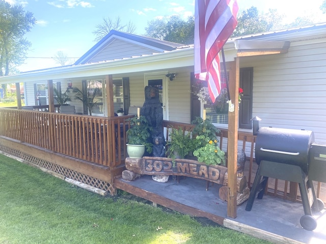 302 Mead St, Utica, MO 64686 - exterior space with a porch and a front yard