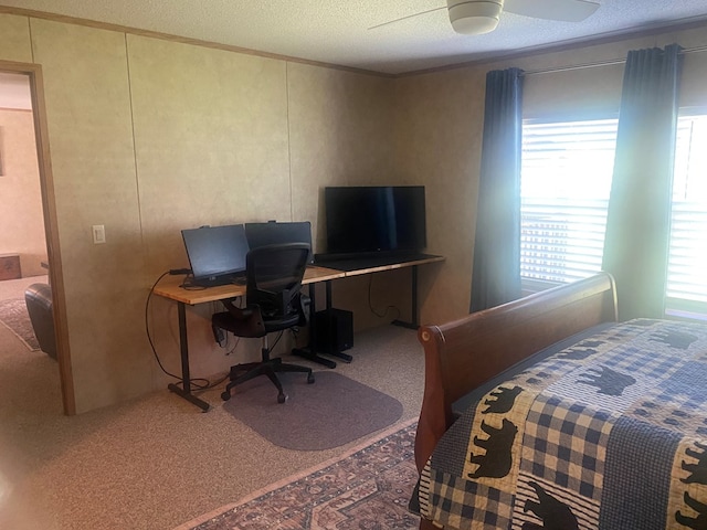 302 Mead St, Utica, MO 64686 - carpeted bedroom with ornamental molding, a textured ceiling, and a ceiling fan