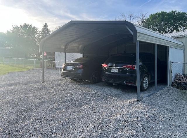 302 Mead St, Utica, MO 64686 - view of car parking featuring a detached carport and fence