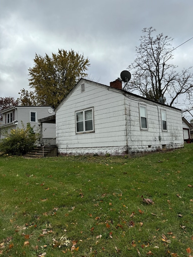 1415 N Franklin St, Kirksville, MO 63501 - view of side of property featuring a lawn