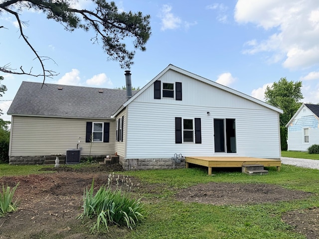 120 W Caldwell St, La Plata, MO 63549 - rear view of house with a deck and roof with shingles