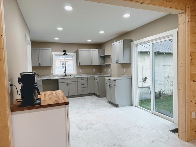 120 W Caldwell St, La Plata, MO 63549 - kitchen featuring gray cabinets, recessed lighting, butcher block counters, and light marble finish floors