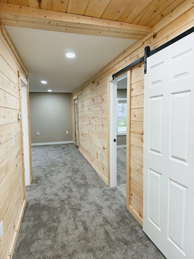 120 W Caldwell St, La Plata, MO 63549 - carpeted spare room with wooden walls, recessed lighting, and a barn door