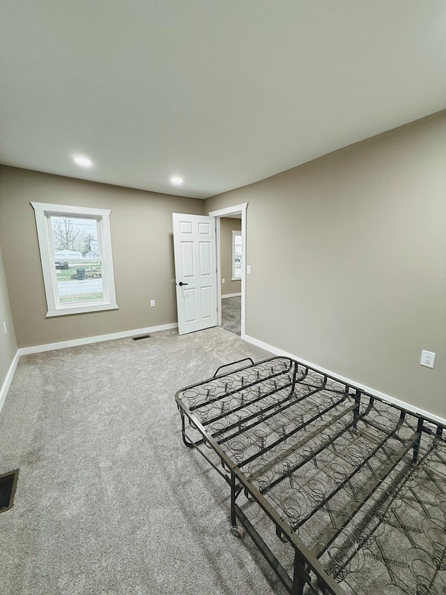120 W Caldwell St, La Plata, MO 63549 - unfurnished bedroom featuring light colored carpet and recessed lighting