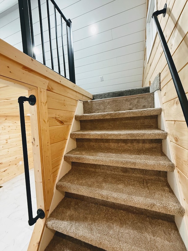 120 W Caldwell St, La Plata, MO 63549 - staircase featuring wood walls