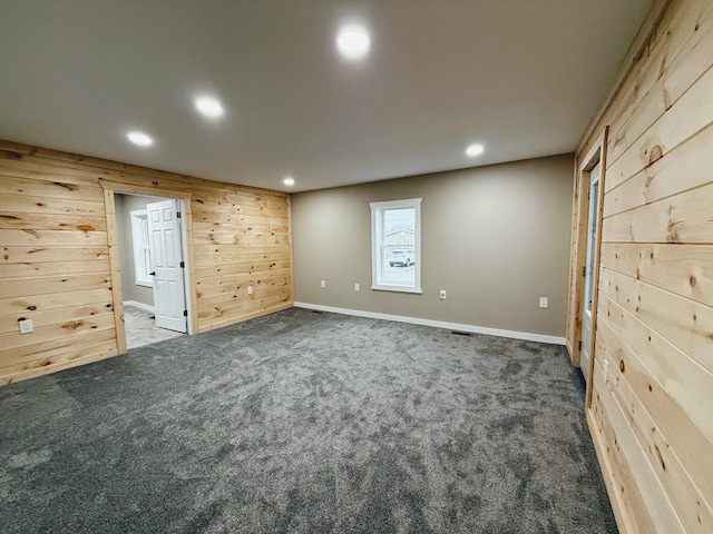120 W Caldwell St, La Plata, MO 63549 - carpeted spare room with recessed lighting and wooden walls