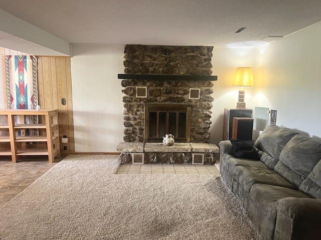 living room featuring a fireplace