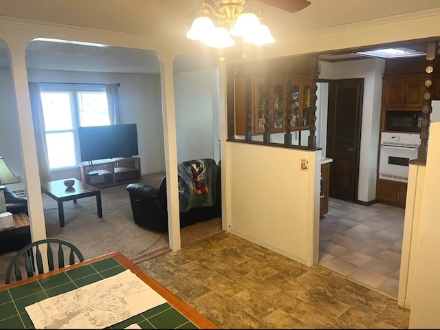 living room featuring ceiling fan