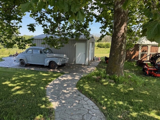 24240 State Highway T, Excello, MO 65247 - view of grassy yard with an outdoor structure