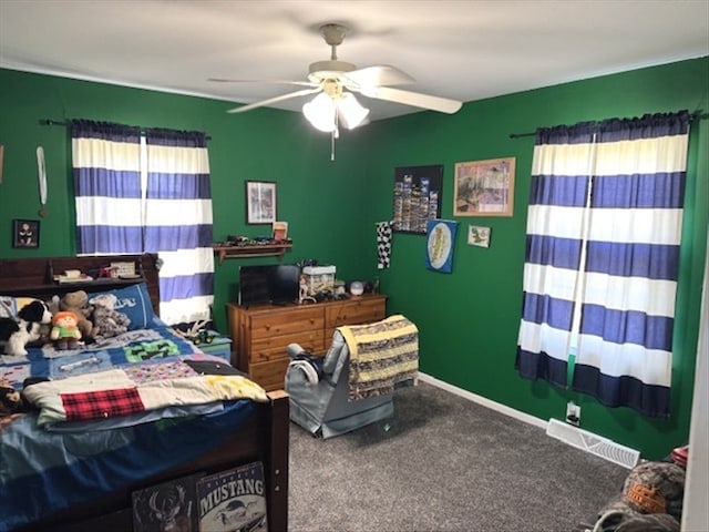 24240 State Highway T, Excello, MO 65247 - bedroom with multiple windows, carpet floors, and a ceiling fan