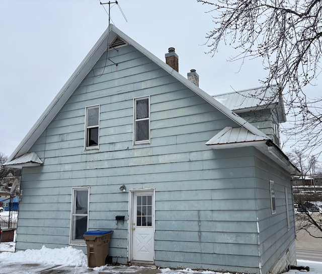 view of snow covered property