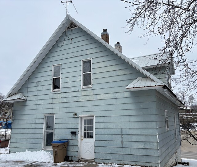 view of snow covered property