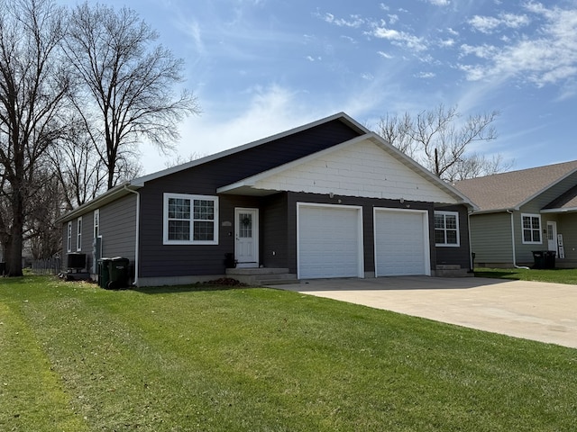 601/603 W Laharpe St, Kirksville, MO 63501 - ranch-style house featuring a garage, a front yard, and driveway