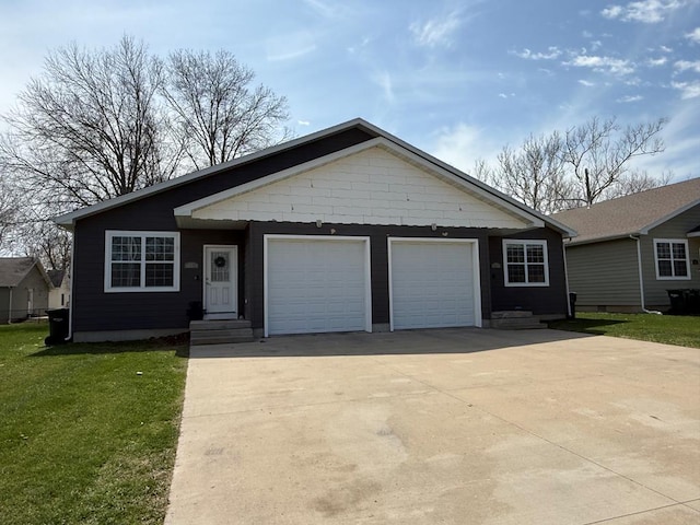 601/603 W Laharpe St, Kirksville, MO 63501 - single story home featuring a front yard, entry steps, driveway, and an attached garage