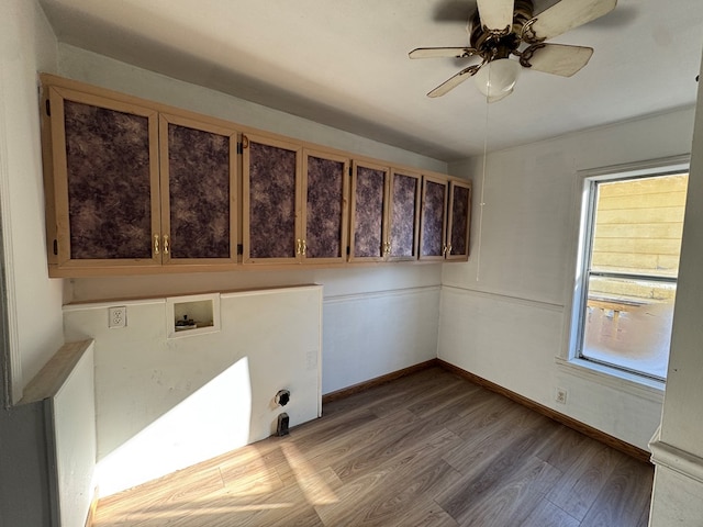 laundry area with cabinets, electric dryer hookup, hookup for a washing machine, ceiling fan, and light hardwood / wood-style flooring