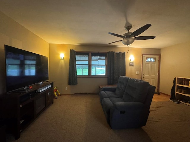 236 N Maple St, Milan, MO 63556 - carpeted living area with ceiling fan and baseboards