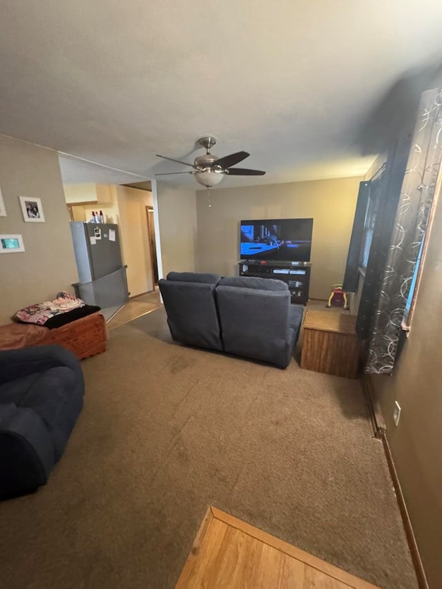 236 N Maple St, Milan, MO 63556 - living area with ceiling fan and carpet floors