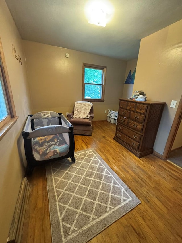 236 N Maple St, Milan, MO 63556 - sitting room with wood finished floors