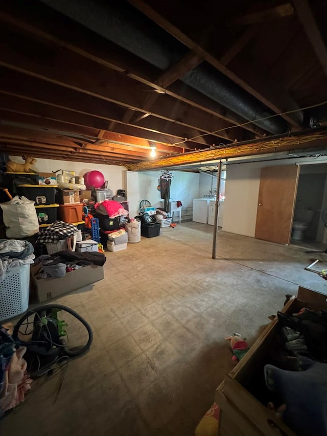 236 N Maple St, Milan, MO 63556 - unfinished basement featuring independent washer and dryer