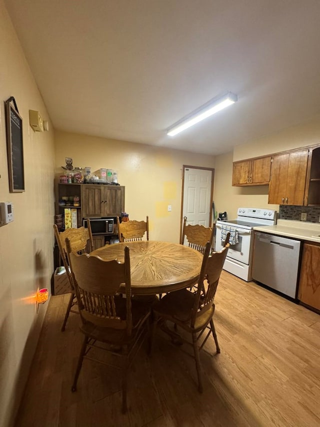 236 N Maple St, Milan, MO 63556 - dining room featuring light wood-style floors