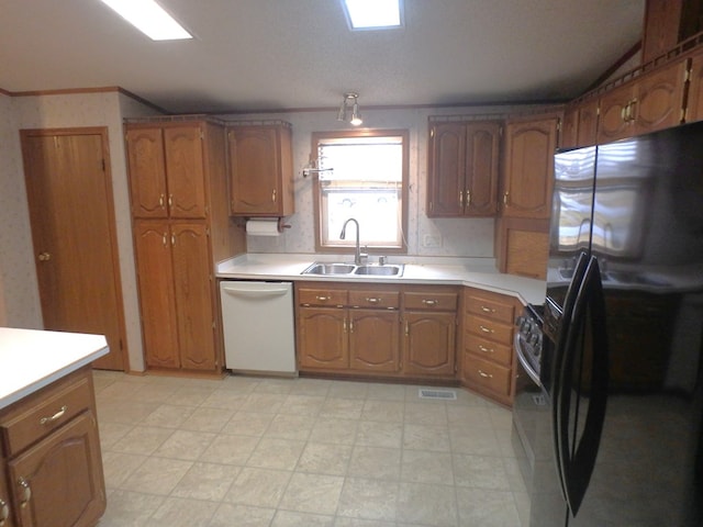 kitchen featuring brown cabinets, white dishwasher, light countertops, refrigerator with ice dispenser, and a sink