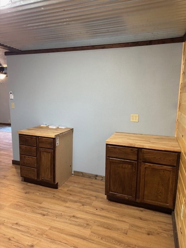 interior space featuring ceiling fan and wood-type flooring