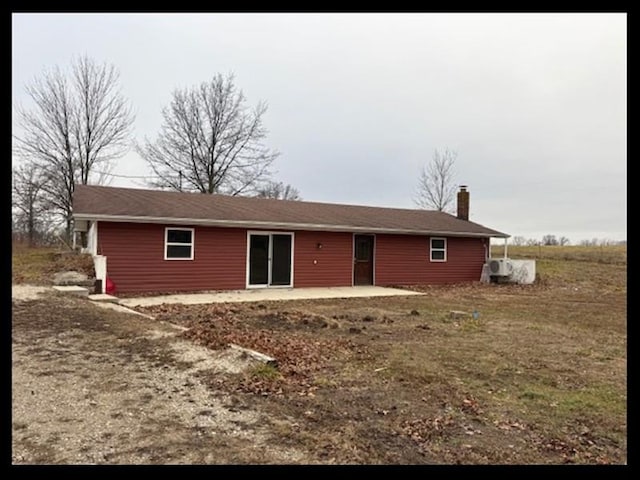 back of house featuring a patio area