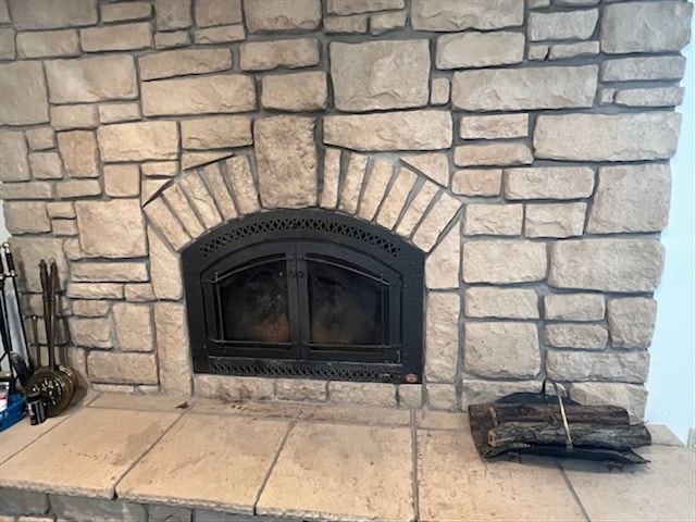 interior details featuring a wood stove