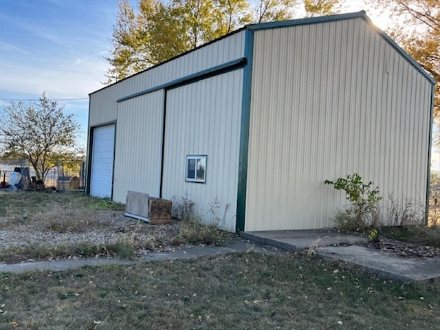 view of outbuilding featuring a garage