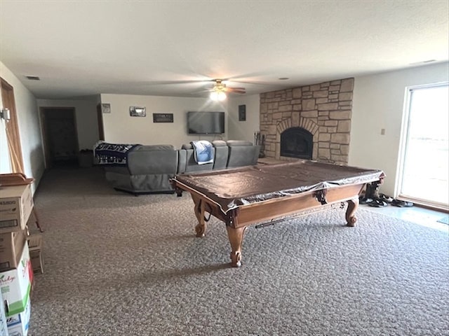 game room with a fireplace, ceiling fan, plenty of natural light, and pool table