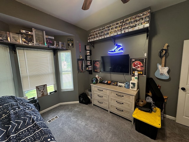 1203 E Randolph St, Kirksville, MO 63501 - bedroom featuring dark carpet and a ceiling fan