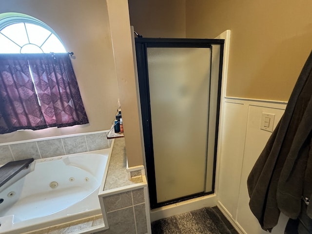 1203 E Randolph St, Kirksville, MO 63501 - full bathroom featuring a shower stall and a tub with jets