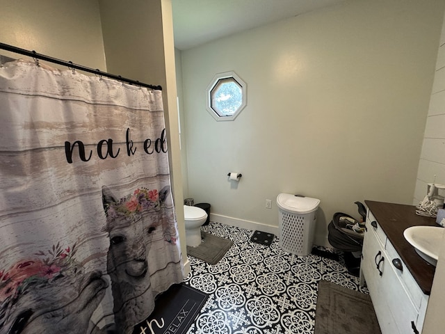 1203 E Randolph St, Kirksville, MO 63501 - bathroom featuring vanity, tile patterned floors, and a shower with shower curtain