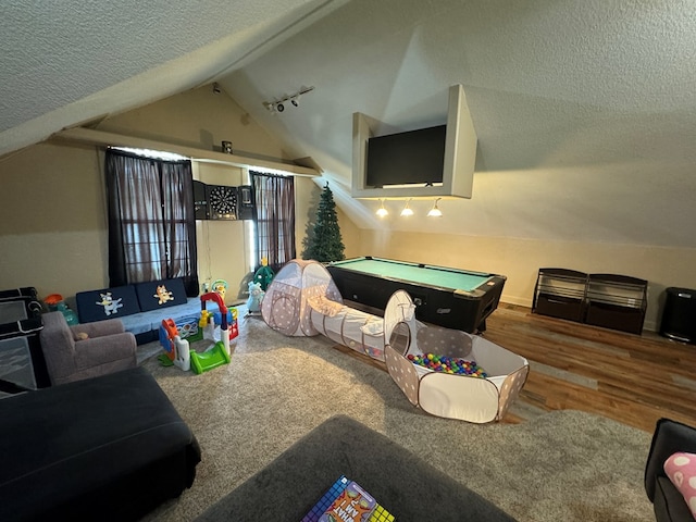 1203 E Randolph St, Kirksville, MO 63501 - game room with billiards table, lofted ceiling, wood finished floors, a textured ceiling, and rail lighting