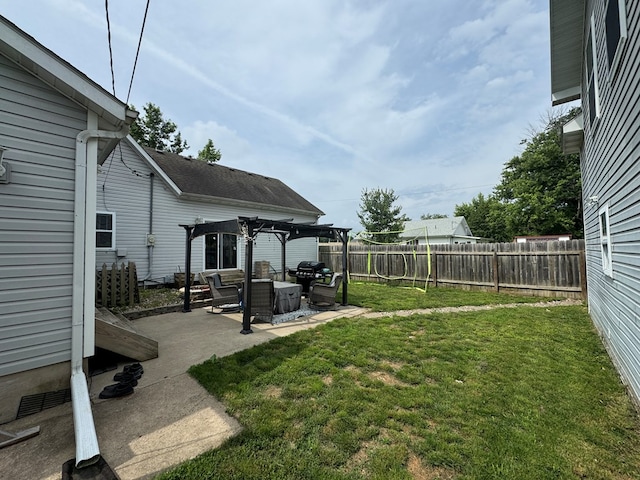 1203 E Randolph St, Kirksville, MO 63501 - fenced backyard with a pergola and a patio