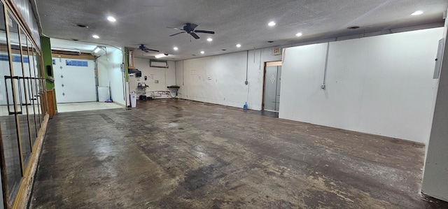 100 Pleasant St, Cincinnati, IA 52549 - garage featuring recessed lighting and ceiling fan