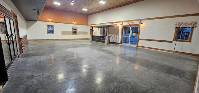 100 Pleasant St, Cincinnati, IA 52549 - garage with baseboards and recessed lighting