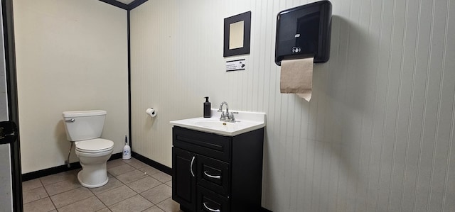 100 Pleasant St, Cincinnati, IA 52549 - half bathroom featuring tile patterned flooring and vanity