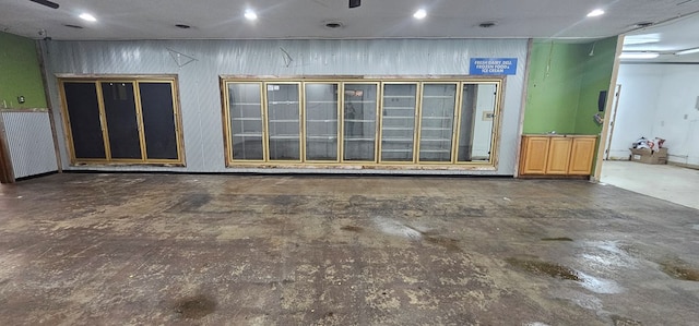 100 Pleasant St, Cincinnati, IA 52549 - miscellaneous room featuring concrete floors and recessed lighting