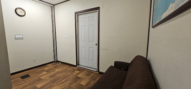 100 Pleasant St, Cincinnati, IA 52549 - hallway featuring dark wood finished floors and baseboards
