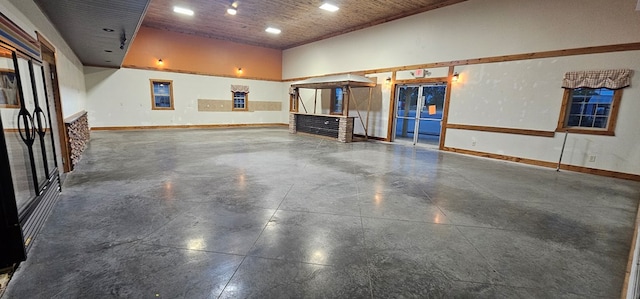 100 Pleasant St, Cincinnati, IA 52549 - garage with baseboards and recessed lighting