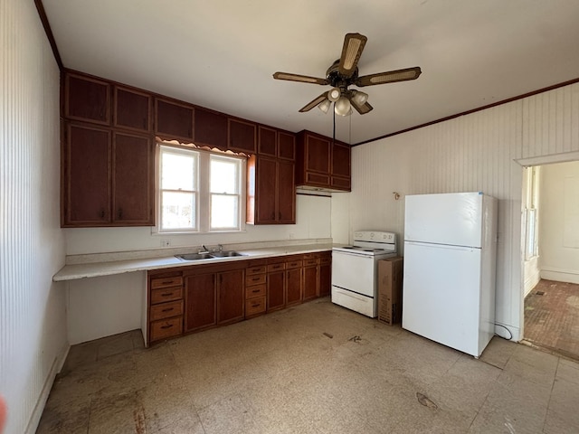 kitchen featuring light floors, light countertops, white appliances, a ceiling fan, and a sink