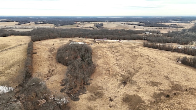 birds eye view of property featuring a rural view