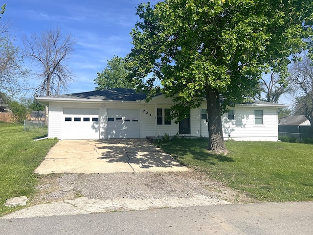 view of front of property with a garage and driveway